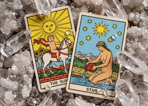 Two mini tarot cards